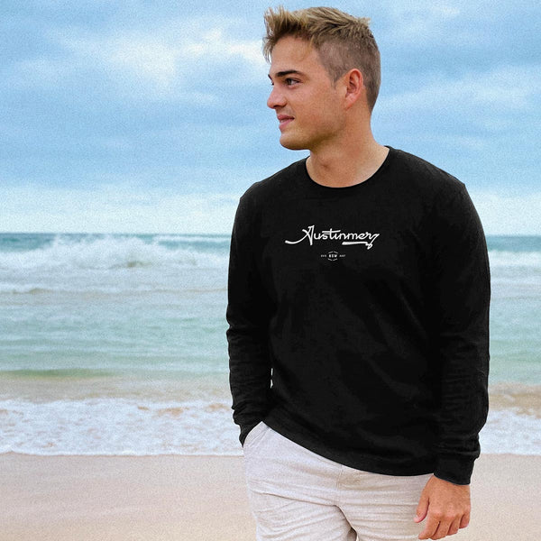 Tim modelling the Unisex black long sleeve tee, with Austinmer printed graphic